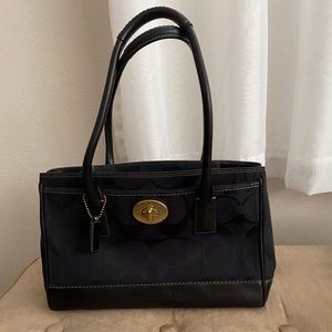 Black Coach purse with dust bag.